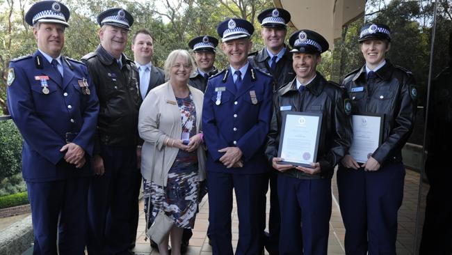 Elizabeth 'Lizzy' BEDELIS receives the 15 Year Lapel Pin to the NSW Police Medallion.