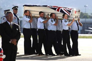 Adam Dunning's coffin is loaded from the aircraft to a hearse at the RAAF Base at Fairbairn. Photo: Andrew Tayl