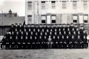 Ted is in the 3rd row ( from front ) and 3rd from the left Unknown Class # at Redfern Academy. Photo would have been taken in 1957.