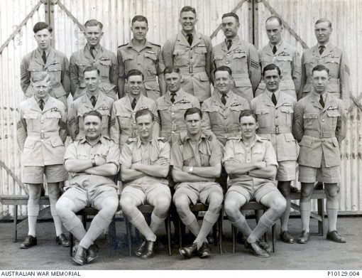 c1942DescriptionFormal group portrait of recent graduates of an Empire Air training Scheme (EATS) pilot training course in held in Rhodesia. The only identified man is 403215 (O210106) Sergeant, later Flight Lieutenant (Flt Lt) David Valentine Paul DFC who like all the new pilots standing in the rear and middle rows is wearing his newly presented wings. Flt Lt Paul enlisted on 4 January 1941 and trained with the Empire Air Training Scheme (EATS) in Rhodesia. Posted to 454 Squadron RAAF he was flying a Baltimore aircraft from a base in North Africa when he was shot down on 4 December 1943 during a sortie over the Mediterranean. Rescued from the sea he became a prisoner of war (POW) of the Germans, finally being released in 1945 at Stalag IVb POW camp in 1945 at Muhlberg, Germany. He joined the NSW police Force after the war and remained in the RAAF Reserve rising to the rank of Squadron Leader. The four men sitting are probably the course flying instructors.