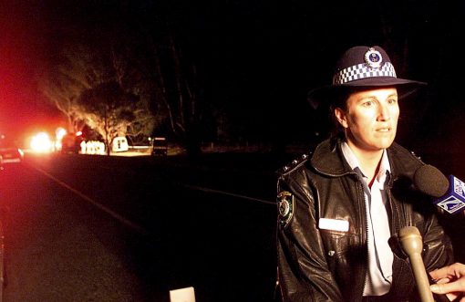 Margaret Majella SAUNDERS; Marg SAUNDERS At the front line: As an acting Inspector, Marg Saunders addresses the media at the scene of a fatal bus crash at Splitters Creek in 2002.