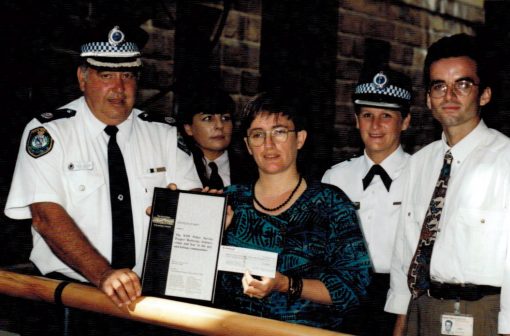 1995 with Alf & I ( Susie Thompson ) at an Award Ceremony after winning the 1994 Australian Heads of Government National Violence Prevention Award for NSWPS. ( I’m hunting where I have higher resolution ).Front L to R Assist Comm Alf Peate, Sue Thompson, Luke PrestonRear: Bron Steele, Chief Supt (?) Lola Scott.