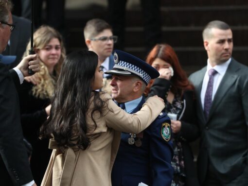 Aaron Vidals fiancee Jessica Loh and father Chief Inspector David Vidal embrace at the constables funeral at St Mary's Cathedral. Picture: Rohan Kelly