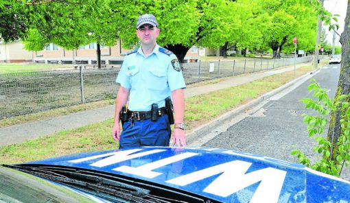 SLOW DOWN: Leading senior constable Wes Bush wants motorists to know Orange Highway Patrol will continue to target speeding in school zones when the school term starts on Tuesday. Photo: JUDE KEOGH. 0124schoolzone1