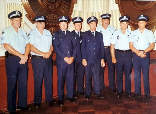 Sgt 2/c Don AVERY on far left, Sgt 2/c ?, SenCon ?, ?, Sgt 3/c ?, ?, Sgt 2/c ?, Constable ?.<br /> Unknown event.<br /> Summer and winter uniforms. Old Diamond NSW Police patch ( so pre early 1980's ) NOT in Order, but those who received Awards on this date are: SenCon Lloyd M. DEVER - Cert of Merit re vehicle fire at Coffs Harbour on 20 Jan 1979. Sgt 3/c Keith GABB - Cert of Merit re electrocution at Coffs Harbour on 20 Jan 1979. SenCon Eric Bruce IDDLES - Bronze Medal re vehicle fire at Coffs Harbour on 20 Jan 1979. ProCst Ian J. YOUNG - Bronze Medal re suicide rescue on Sydney Harbour Bridge on 30 Jan 1979. Sgt 3/c Donald Lester AVERY - Cert. of Merit for building fire at Manly on 10 June 1978. Sgt 3/c Donald CAMPBELL - Bronze Medal re suicide rescue at The Gap, Watsons Bay on 12 Sept 1978. Sgt 2/c Henry Derold George KUPKE - Bronze Medal ( Bar ) re suicide rescue at The Gap, Watsons Bay on 12 Sept 1978. Sgt 3/c John KELLY - Cert. of Merit at Narrabri Ck on 12 Aug 1978. That is eight of the eight in photo.