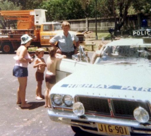 John SOLVYNS. From Col Colman: John offered his services to a local convent school picnic day, showing all the children his car. With NSWP Highway Patrol vehicle - Chrysler Valiant Charger - Regd # JIG-901