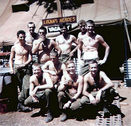 https://www.5rar.asn.au/gallery/thompson-2.htm<br /> LOGAN'S HEROES<br /> NUI DAT 1969<br /> Members of 2 Section, 2 Platoon, A Company 5RAR, posing for a group photo during a break in patrols and operations.<br /> ( Standing L to R ): Merv Tuckett, Terry Bateman, Vince Fallins, Michael Boulton, Greg Knight and Michael Skelly.<br /> ( Front ): Neville Thompson, John Riley, Norm Carrington and John Logan.