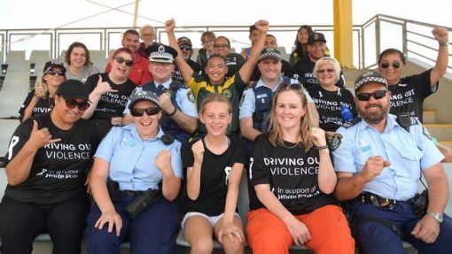 Elise Marie CARTER nee Elise MONJO, Elise CARTER, Grommy. Raising awareness and showing their support during the White Ribbon Day convoy are Senior Constables Elise Carter and Dennis Hoyne with community members at Campbelltown Sports Stadium.