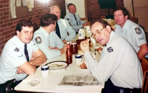Back left: Bob McDonagh ( # 8565 ), Don Paterson ( # 9183 ), Warren McDonald, Col Pateman ( # 16846 ), Bruce McKeachie ( # 6785 ), Trevor Tobin ( # 14323 ) taken in 1980s in the meal room at the old Fairfield Police station, Smart St, Fairfield, NSW.
