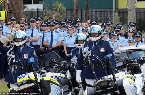 Tanzeel Iftikhar BASHIR. A large contingent of shocked police officers gathered at Narellan Cemetery to salute their late colleague.