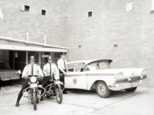 Rear of the old Wollongong Police Station - next to the Wollongong Court House. January 1963. Constables ? KILNE # ????, Cst Richard ' Dick ' BROOK # 9570, Carey GARDINER # 7563